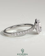 Kynora CJ 2ct cushion cut diamond halo engagement ring with pave band, showcasing elegant jewelry design and sparkling gemstones.