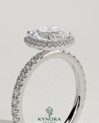 Kynora CJ 2ct cushion cut diamond halo engagement ring with pave band, showcasing elegant jewelry design.