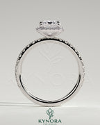 Kynora CJ 2ct emerald claw solitaire engagement ring with halo and pave band, showcasing sparkling center stone and detailed design.