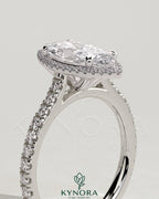 Kynora CJ 2ct marquise claw solitaire engagement ring with halo, pave band, and cathedral high setting in elegant jewelry design
