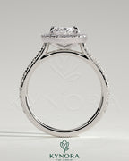 Kynora CJ 2ct oval claw solitaire engagement ring with halo, pave band, and cathedral high setting, showcasing intricate design details.