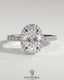 Kynora CJ 2ct oval claw solitaire engagement ring with halo and pave band, showcasing sparkling diamond details.