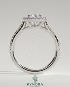 Kynora CJ 2ct pear-shaped diamond solitaire engagement ring with halo, pave band, and cathedral high setting.