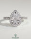 Kynora CJ 2ct pear-shaped diamond solitaire engagement ring with halo and pave band in elegant jewelry design.