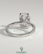 Kynora CJ 2ct radiant cut claw solitaire engagement ring with halo and pave band, showcasing sparkling diamond details.