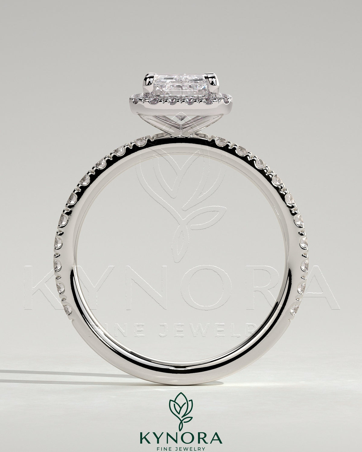 Kynora CJ 2ct radiant cut diamond halo engagement ring with pave band and intricate setting, showcasing elegance and sparkle.