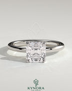 Kynora CJ 2-carat Asscher cut diamond claw solitaire engagement ring with a sleek platinum band.