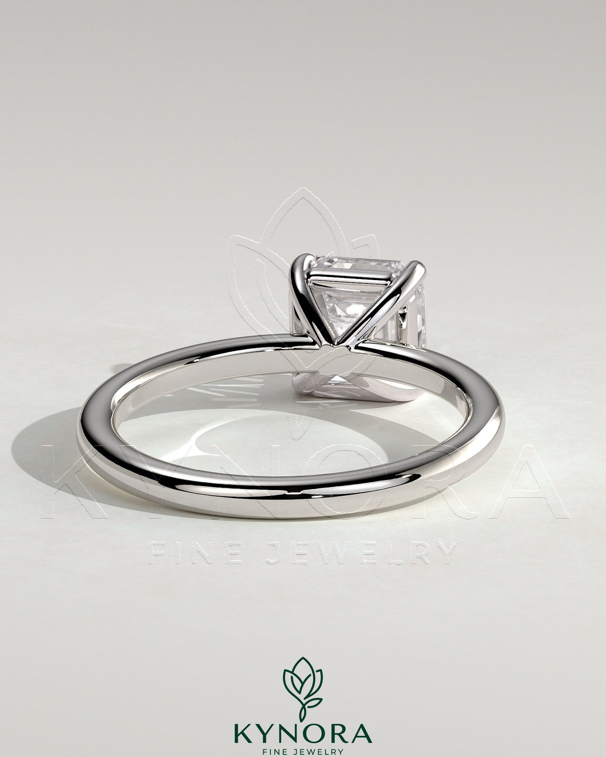 Kynora CJ 2-carat Asscher cut diamond solitaire engagement ring with claw setting, showcasing elegant craftsmanship and sparkling gem.