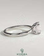Kynora CJ 2ct Asscher cut diamond solitaire engagement ring with claw setting, elegant and sparkling jewelry piece.
