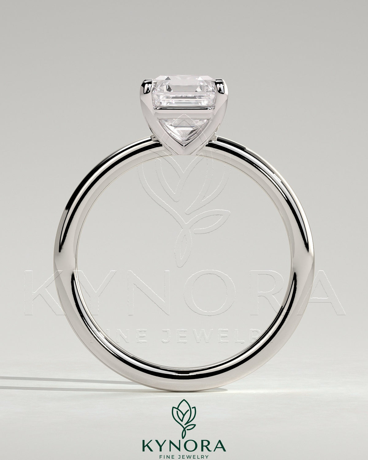 Kynora CJ 2ct Asscher cut diamond solitaire engagement ring with a claw setting, showcasing the elegant jewelry design.