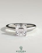 Kynora CJ 2ct Asscher cut diamond solitaire engagement ring with hidden halo and cathedral high setting.