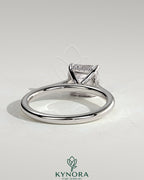 Kynora CJ 2-carat Asscher cut solitaire engagement ring with hidden halo and cathedral high setting, elegant and sparkling jewelry.