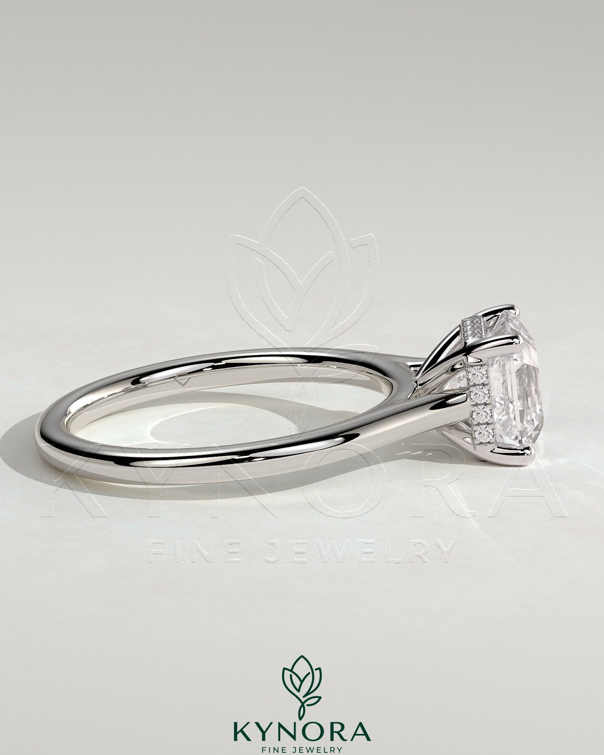 Kynora CJ 2ct Asscher cut diamond solitaire engagement ring with hidden halo and cathedral high setting, showcasing elegant jewelry design.