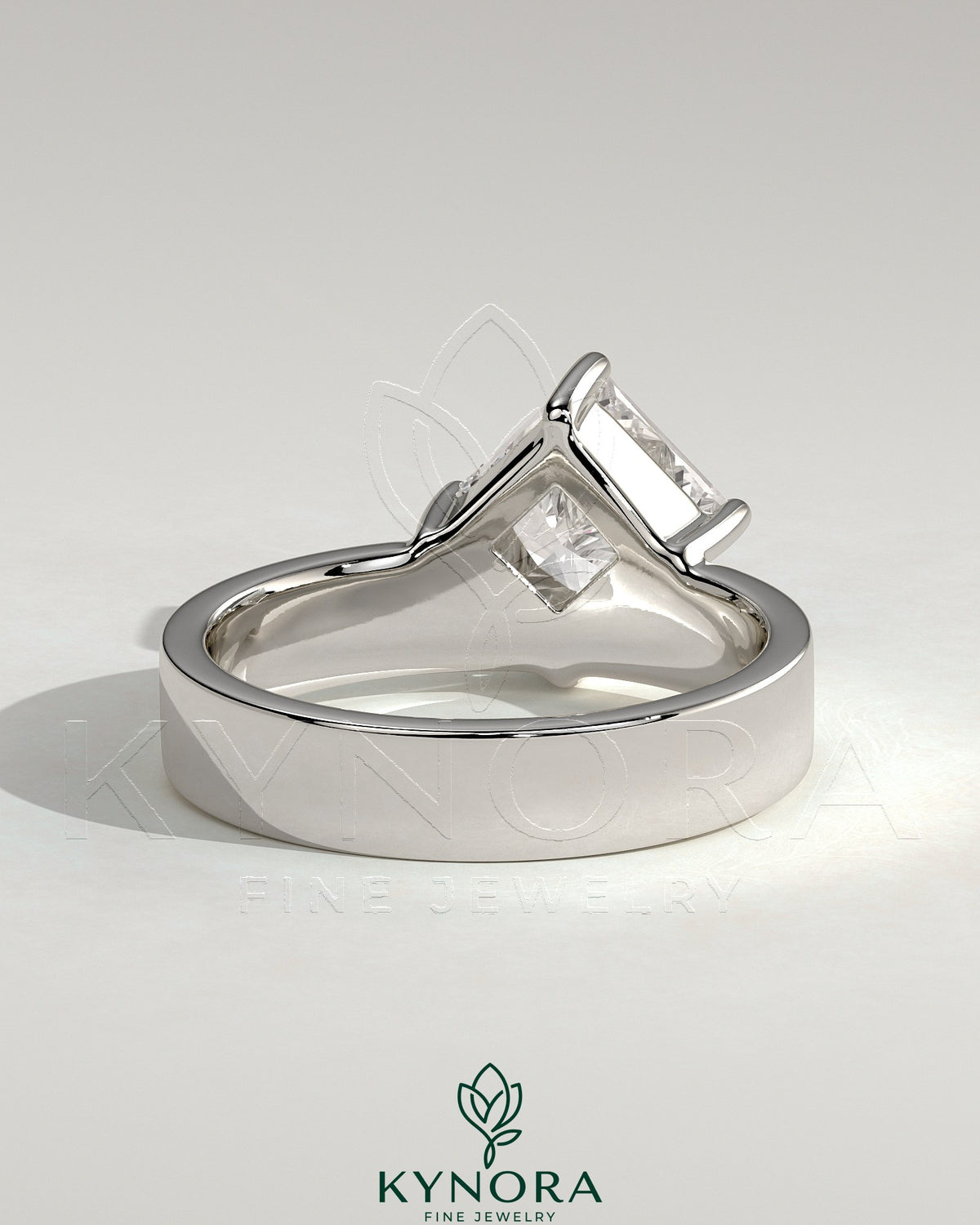 Kynora CJ 2ct Asscher cut diamond solitaire engagement ring with offset setting and flat cigar band, showcasing elegant jewelry design.