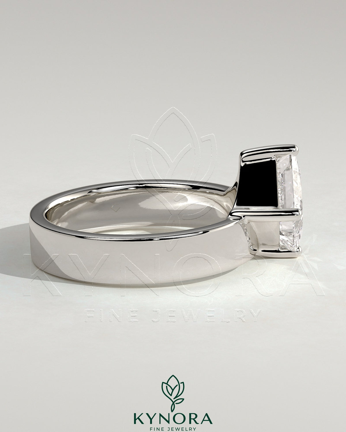 Kynora CJ 2ct Asscher cut diamond solitaire engagement ring with offset setting and flat cigar band in yellow gold.