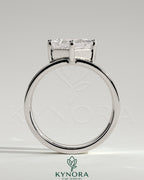 Kynora CJ 2ct Asscher cut solitaire engagement ring with claw setting, offset design, and flat cigar band in sterling silver.