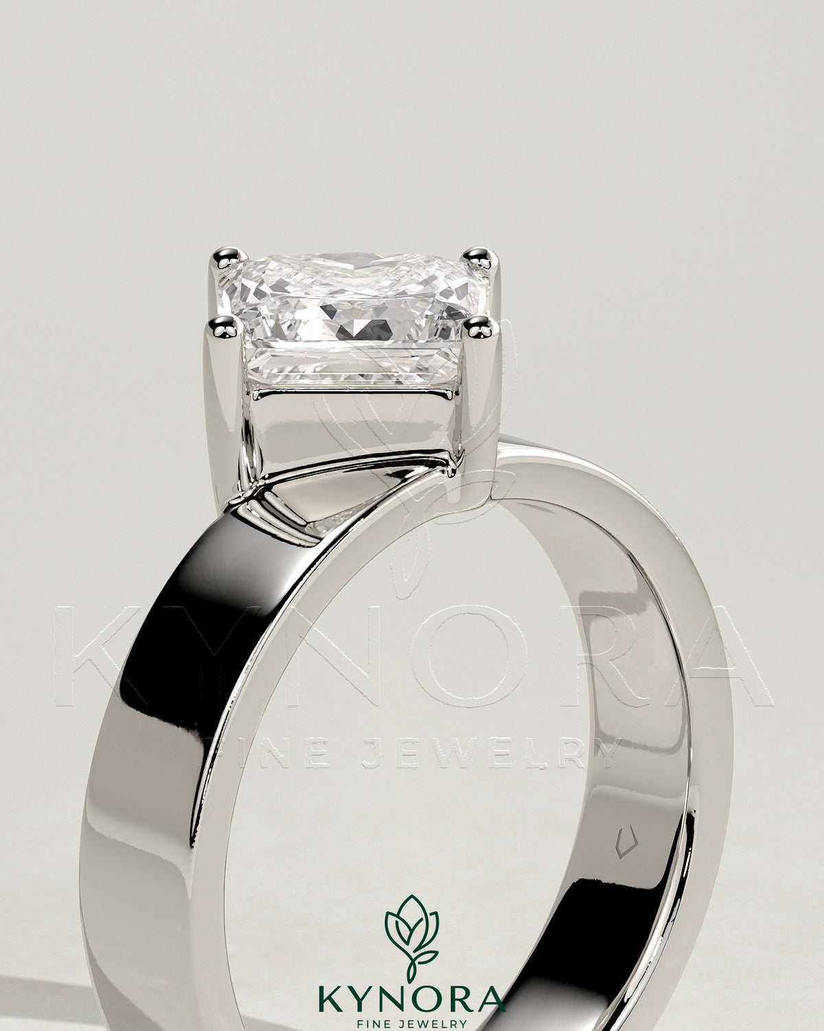 Kynora CJ 2ct Asscher cut diamond solitaire engagement ring with claw setting, offset design, and flat cigar band.
