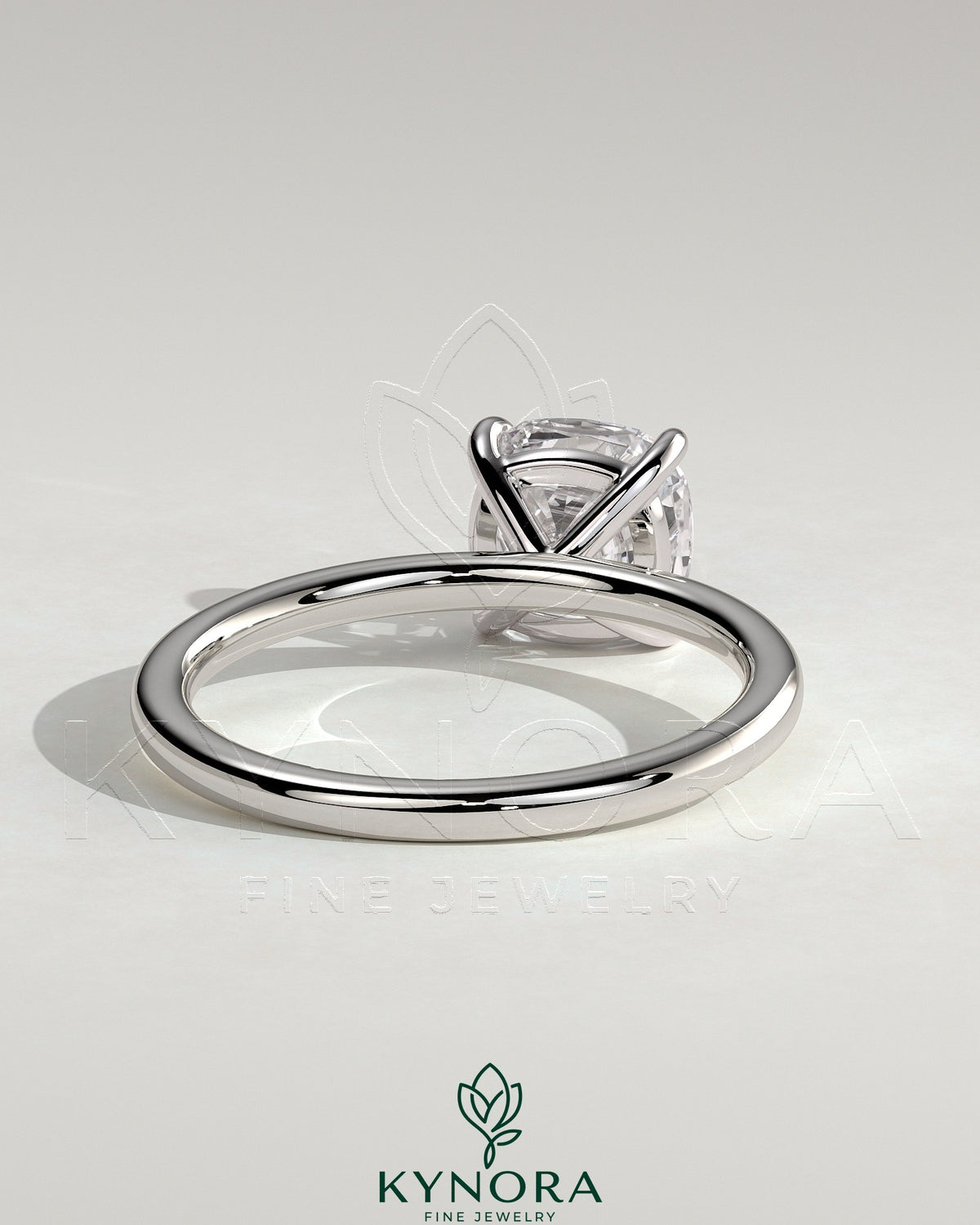 Kynora CJ 2ct cushion cut diamond solitaire engagement ring with claw setting, elegant and classic jewelry piece.