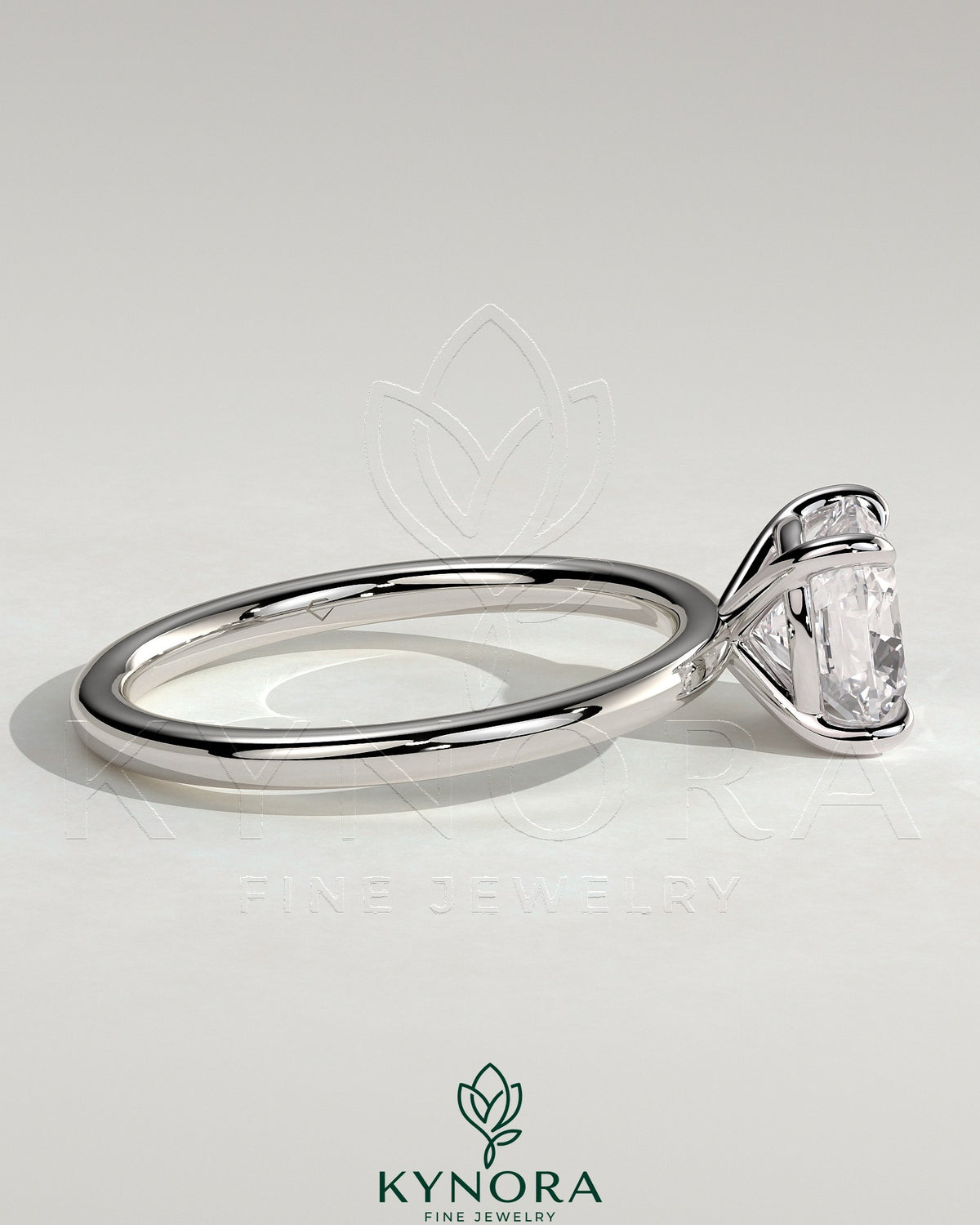 Kynora CJ 2ct cushion cut diamond solitaire engagement ring featuring a classic claw setting on a sleek band
