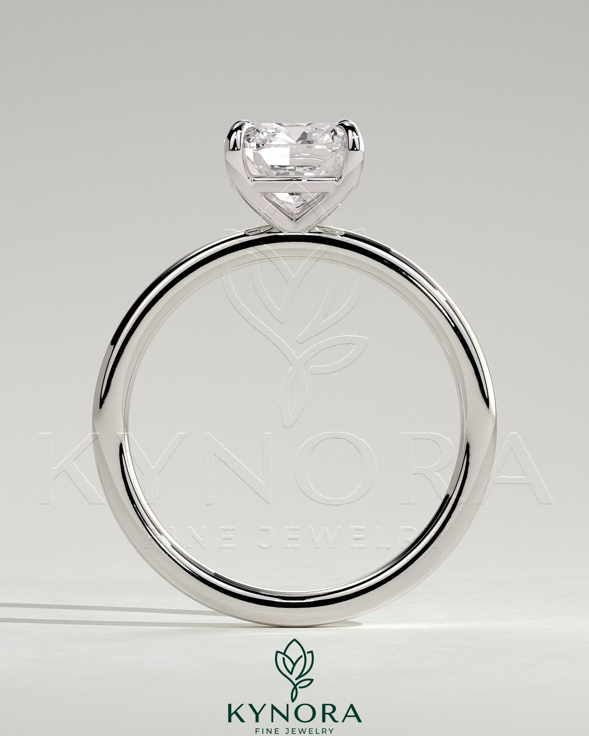 Kynora CJ 2-carat cushion cut solitaire engagement ring with a sleek band and sparkling diamond centerpiece.