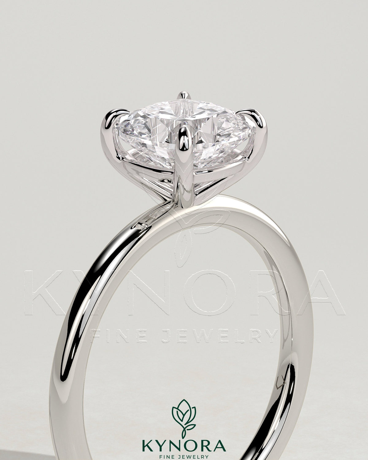 Kynora CJ 2-carat cushion claw solitaire engagement ring with a sparkling diamond set in a sleek platinum band.
