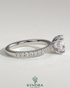 Kynora CJ 2-carat cushion cut solitaire engagement ring with hidden halo and pave band, elegant and sparkling jewelry piece