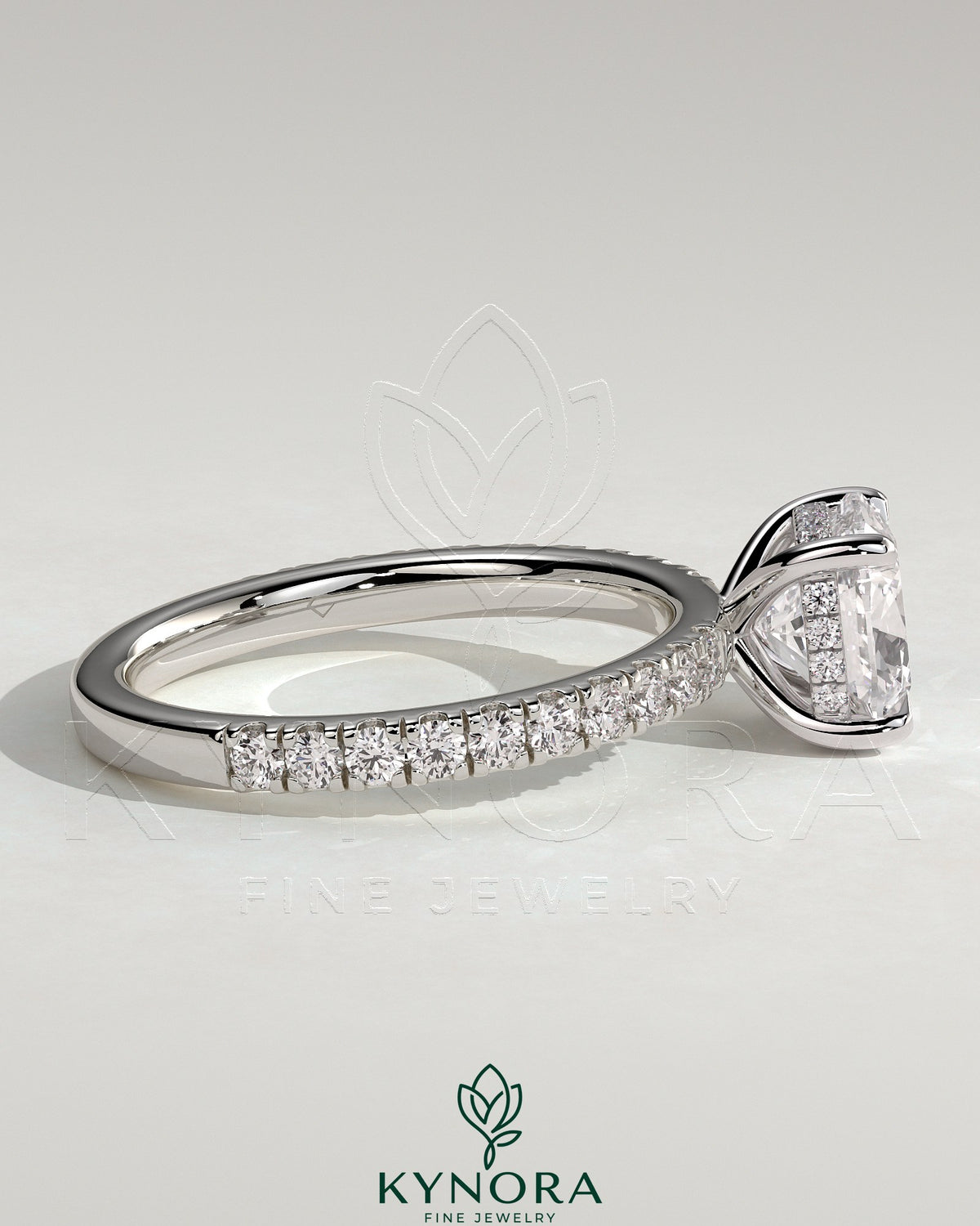 Kynora CJ 2-carat cushion cut solitaire engagement ring with hidden halo and pave band, elegant and sparkling jewelry piece