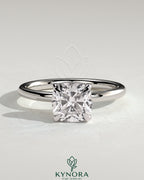 Kynora CJ 2ct cushion cut solitaire engagement ring with hidden halo, featuring a classic and elegant design.