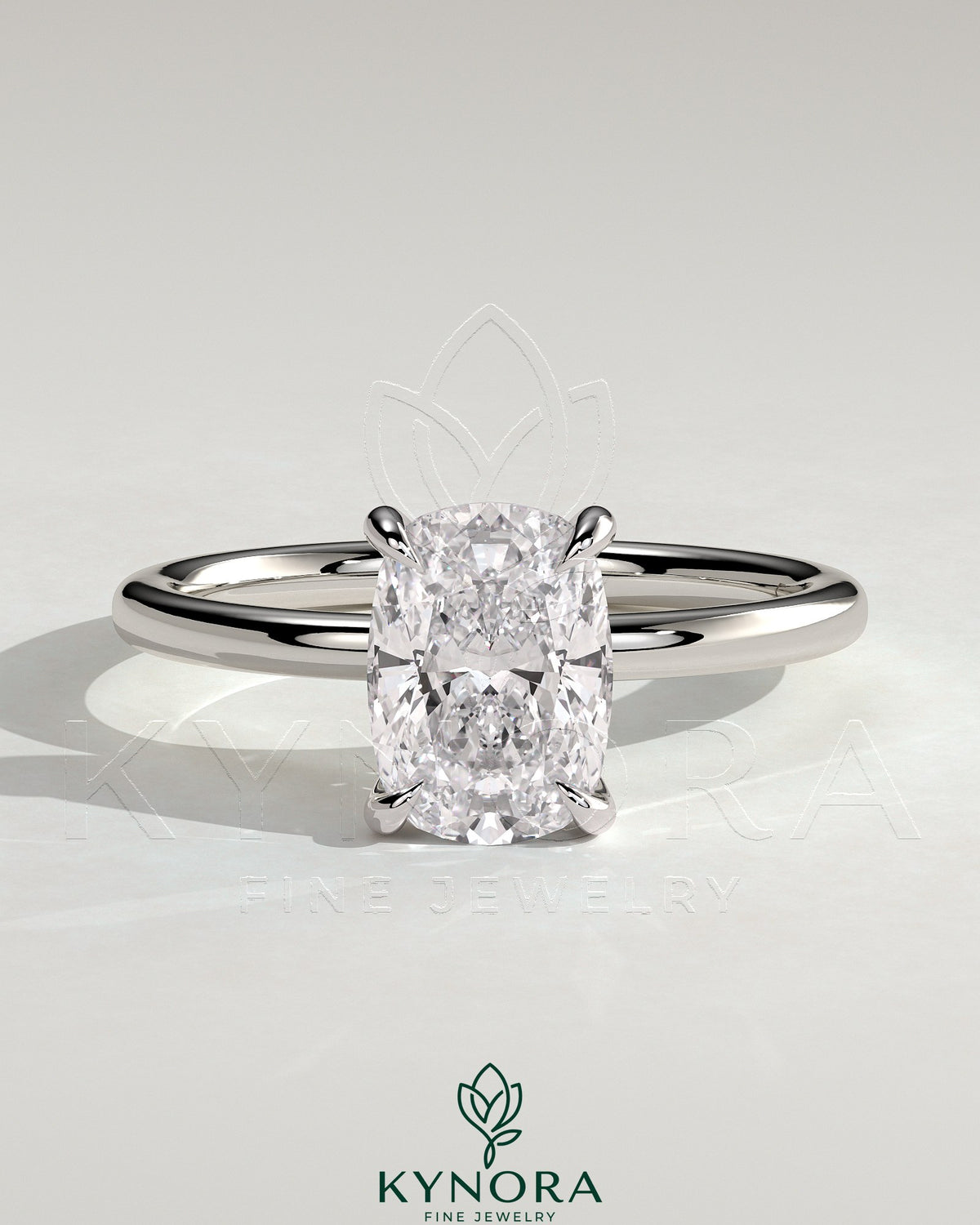 Kynora CJ 2ct elongated cushion cut diamond solitaire engagement ring with a sleek gold band and classic design.