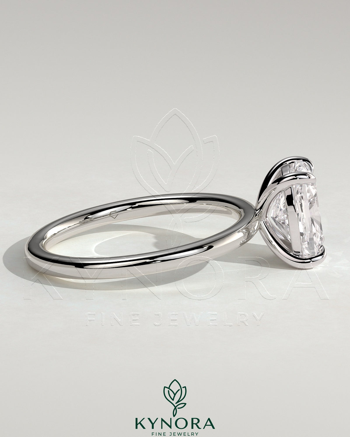 Kynora CJ 2ct elongated cushion cut diamond solitaire engagement ring with a sleek band and elegant design.