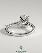 Kynora CJ 2ct elongated cushion cut diamond solitaire engagement ring with cathedral low setting and open trellis gallery design