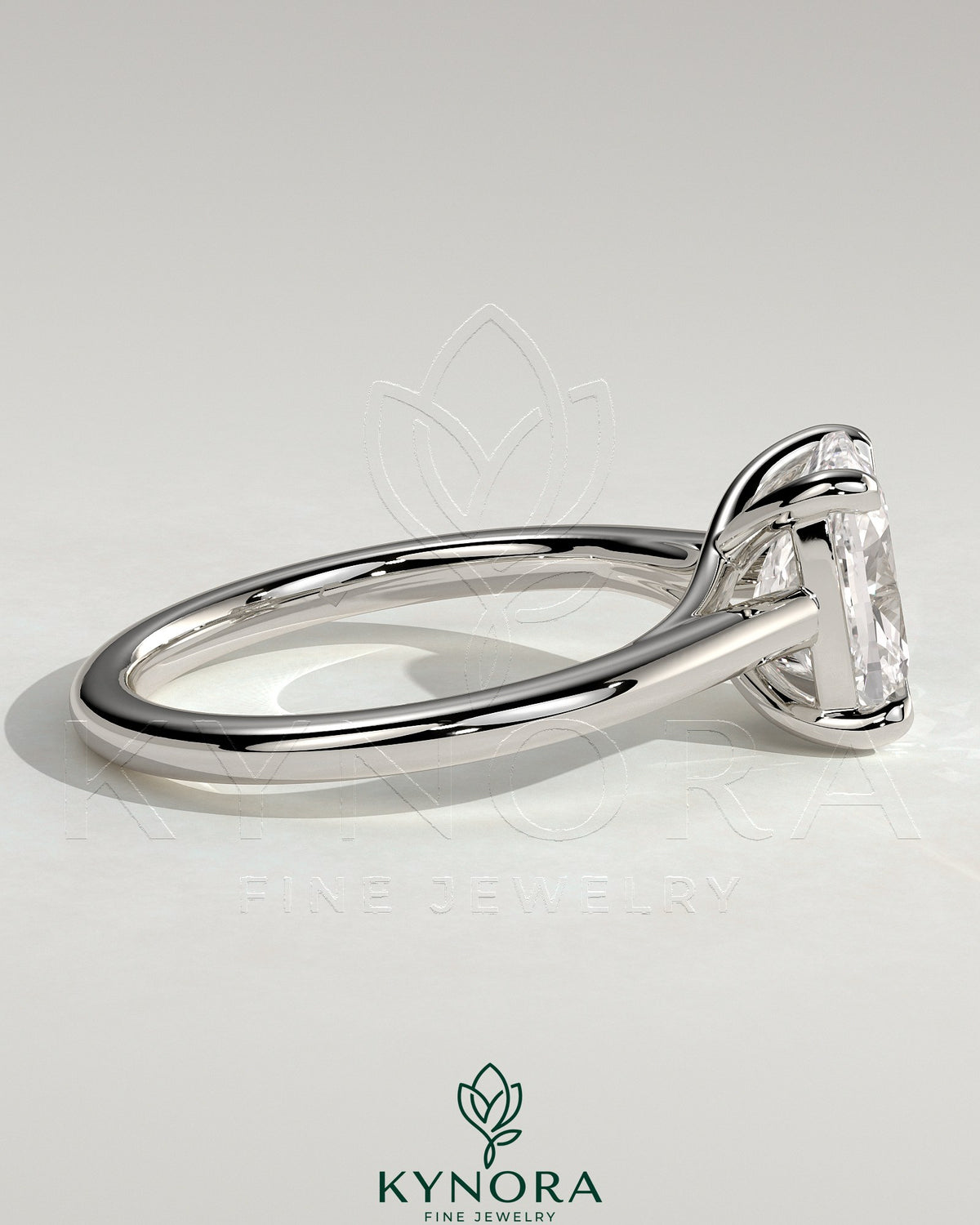 Kynora CJ 2ct elongated cushion cut solitaire engagement ring with cathedral low setting and open trellis gallery design.