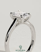 Kynora CJ 2ct elongated cushion claw solitaire engagement ring with cathedral low setting and open trellis gallery.