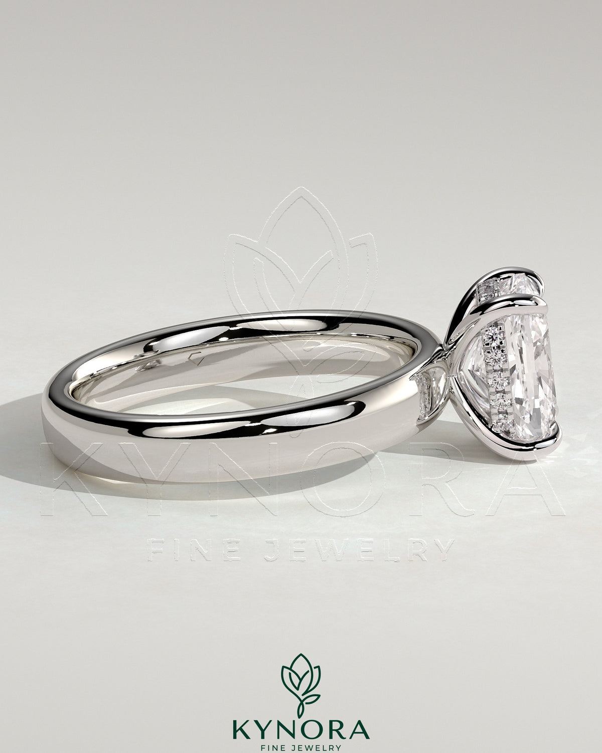 Kynora CJ 2ct elongated cushion solitaire engagement ring with cigar band and hidden halo design, featuring a sparkling diamond.