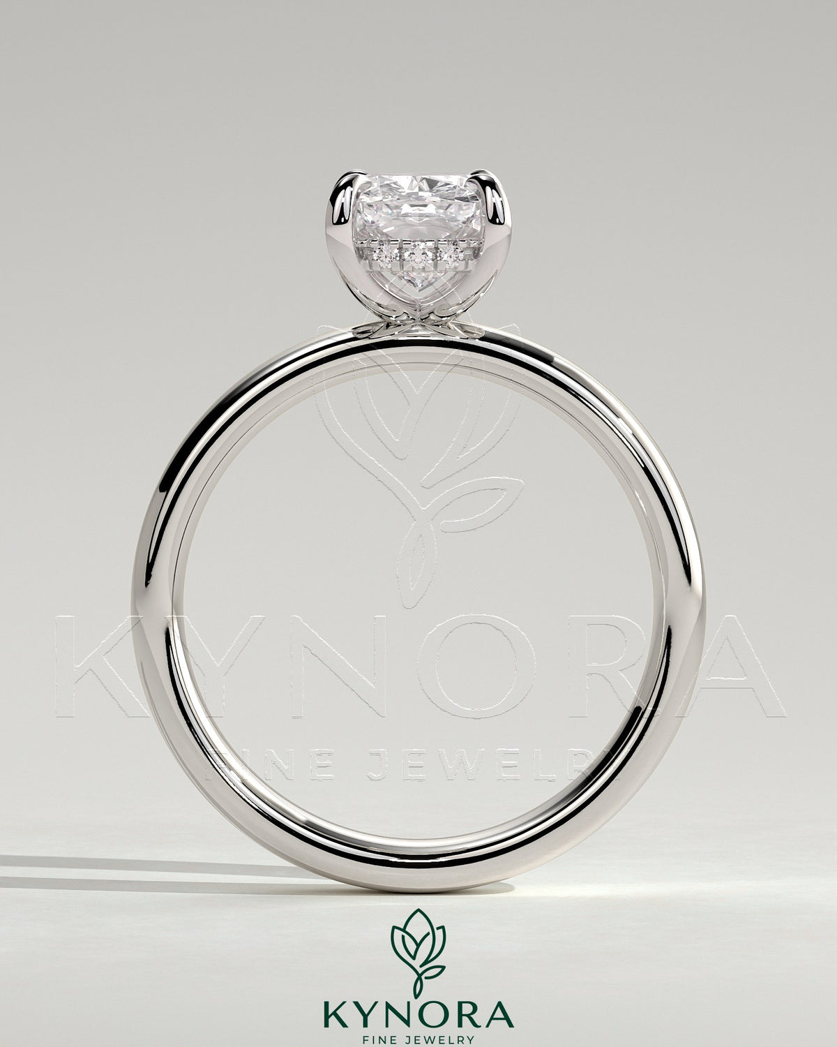 Kynora CJ 2ct elongated cushion cut solitaire engagement ring with cigar band and hidden halo, showcasing detailed craftsmanship.