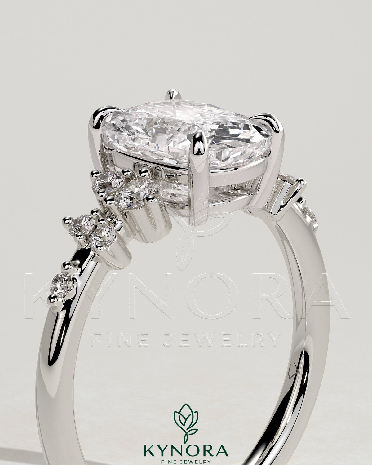 Kynora CJ 2ct elongated cushion claw solitaire engagement ring with clustered round shoulder stones, showcasing elegant jewelry design.