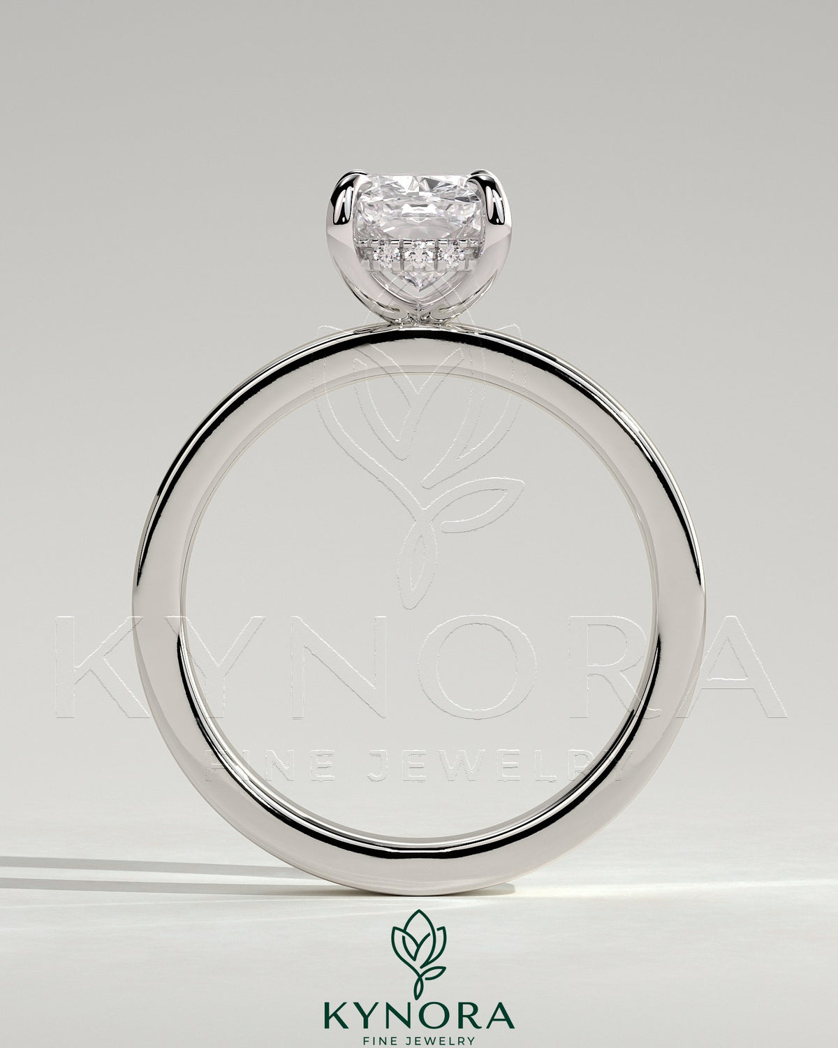 Kynora CJ 2ct elongated cushion claw solitaire engagement ring with flat cigar band and hidden halo design