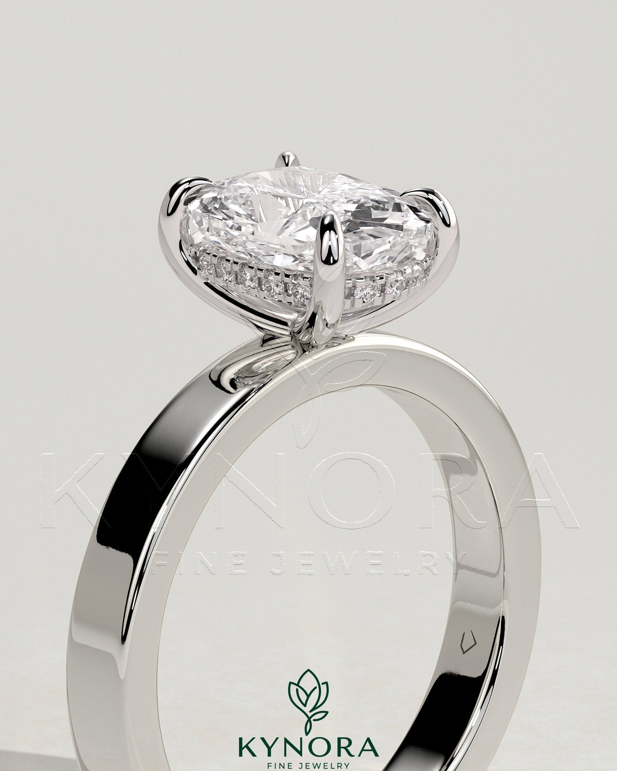 Kynora CJ 2ct elongated cushion cut solitaire engagement ring with flat cigar band and hidden halo in sterling silver.