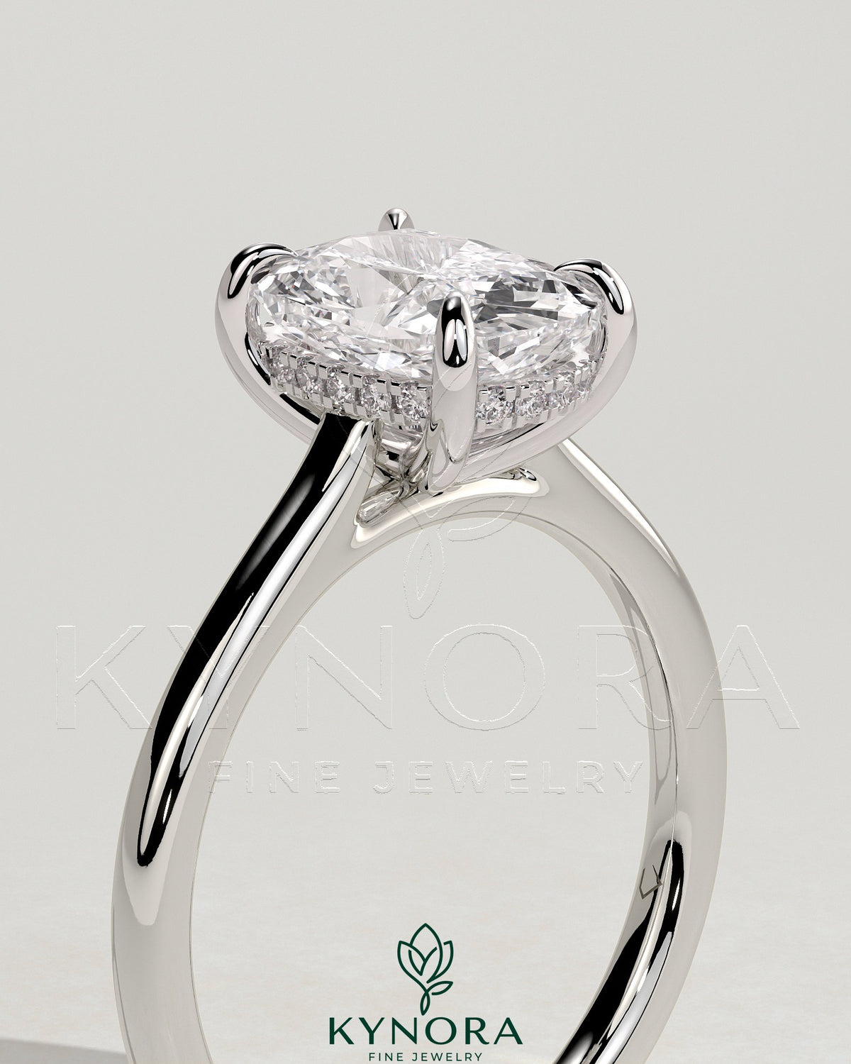 Kynora CJ 2ct elongated cushion diamond solitaire engagement ring with hidden halo and cathedral high setting.