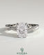 Kynora CJ 2ct elongated cushion cut solitaire engagement ring with hidden halo and twisted pave band, showcasing craftsmanship.