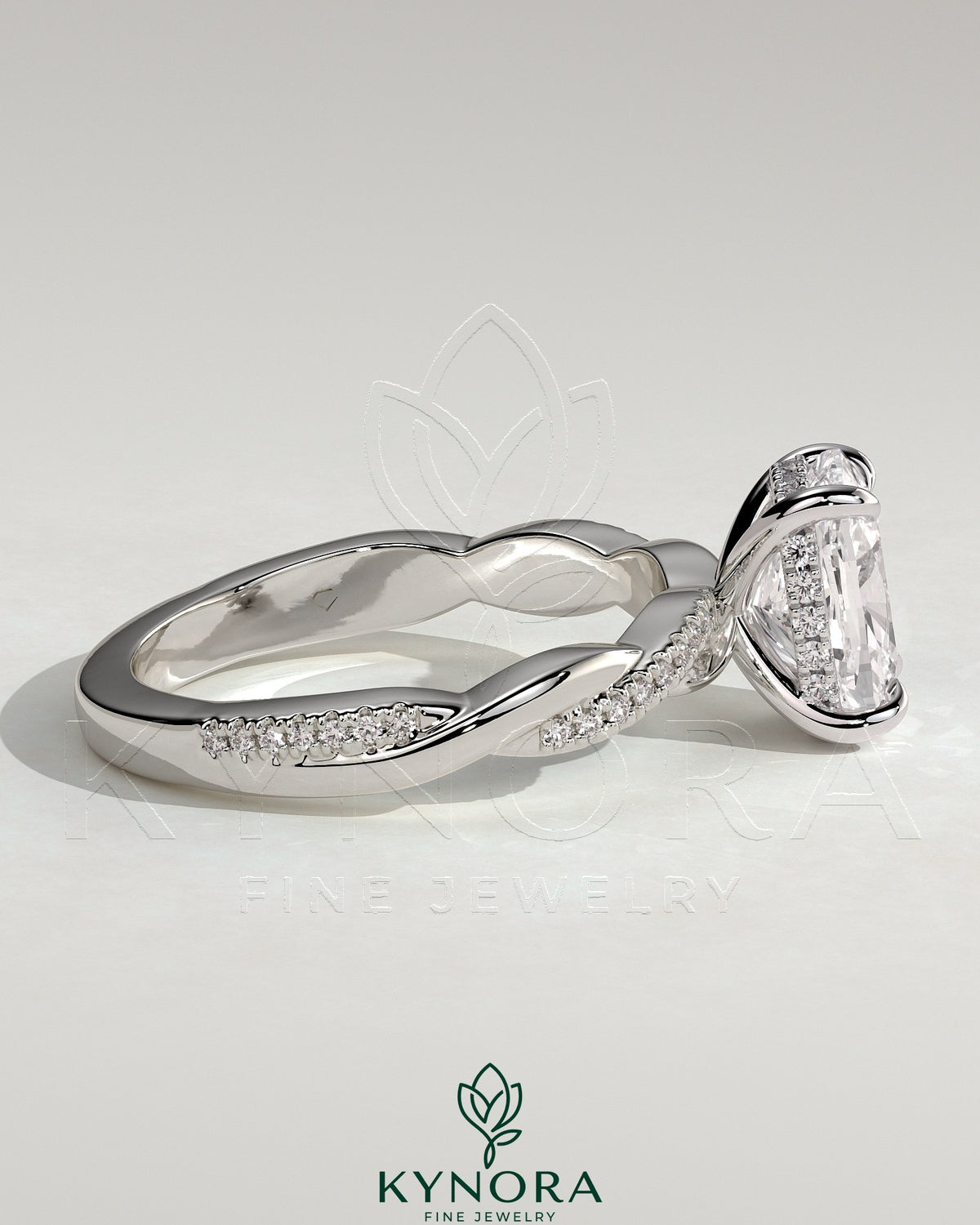 Kynora CJ 2ct elongated cushion cut solitaire engagement ring with hidden halo and twisted pave band, gold or platinum setting.
