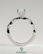 Kynora CJ 2ct elongated cushion solitaire engagement ring with hidden halo and twisted pave band, elegant and sparkling jewelry piece.