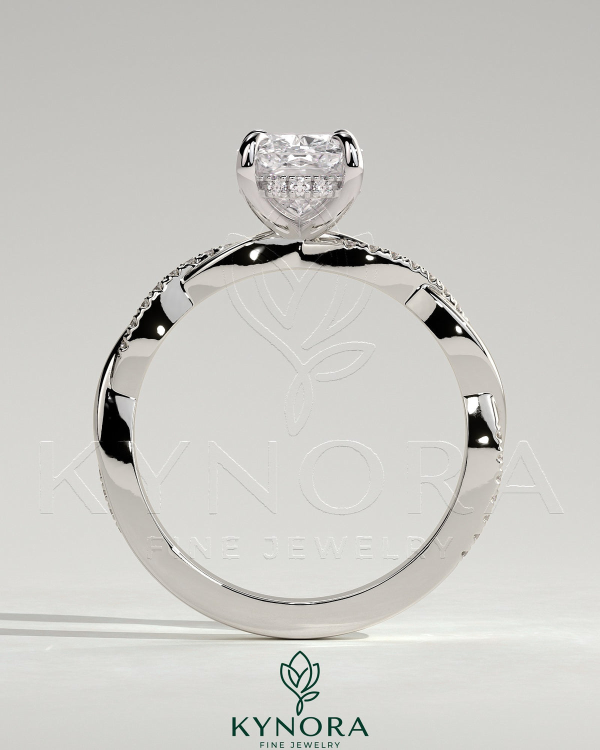 Kynora CJ 2ct elongated cushion solitaire engagement ring with hidden halo and twisted pave band, elegant and sparkling jewelry piece.