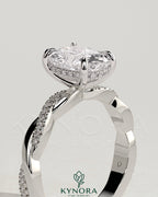 Kynora CJ 2ct elongated cushion diamond solitaire engagement ring with hidden halo and twisted pave band, elegant jewelry design.