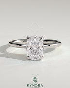Kynora CJ 2ct elongated cushion solitaire engagement ring with hidden halo in sterling silver, detailed close-up of the ring design.