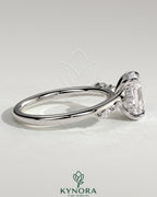 Kynora CJ 2ct elongated cushion solitaire engagement ring with hidden halo, opposing marquise accents, cathedral high setting.