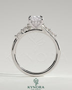 Kynora CJ 2ct elongated cushion solitaire engagement ring with hidden halo, marquise accents, and cathedral high setting.