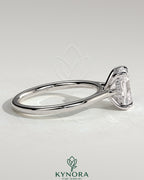 Kynora CJ 2ct elongated cushion solitaire engagement ring with hidden halo, tapered band, cathedral high setting and intricate design