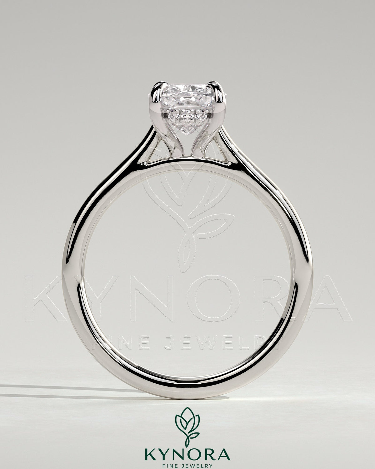 Kynora CJ 2ct elongated cushion cut solitaire engagement ring with hidden halo, tapered band, and cathedral high setting.