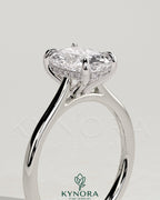 Kynora CJ 2ct elongated cushion cut solitaire engagement ring with hidden halo, tapered band, and cathedral high setting.